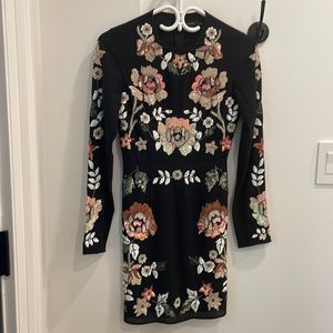 Needle and thread embellished dress